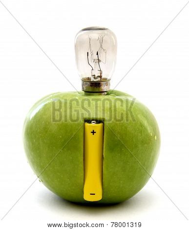 Green Apple With A Lamp And A Battery