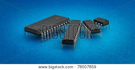 Various Integrated Circuits On A Colored Background