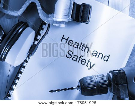 Health And Safety Register With Goggles, Drill And Earphones