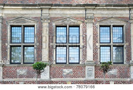 Three Windows Of Old Raesfeld Water Castle In Germany