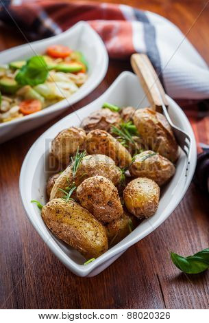 Oven baked potatoes with cabbage salad