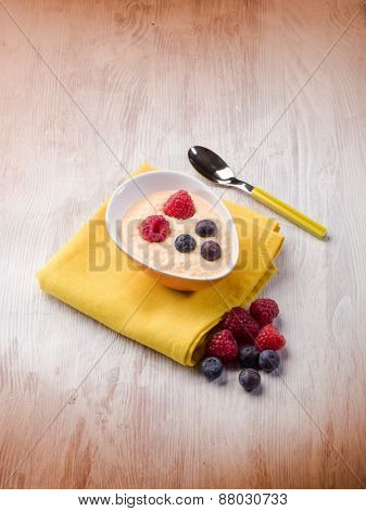 orange sorbetto with blueberry and raspberry