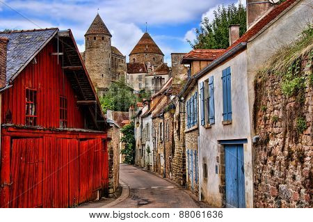 Beautiful Burgundy street with ancient towers, France
