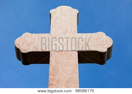 Cross against the blue sky