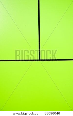 Green Wall Tiles Affixed To The Wall Of The Building