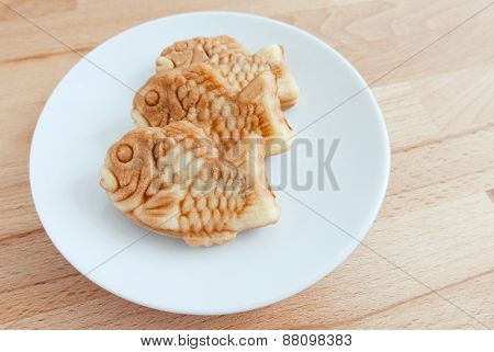 Japanese fish-shaped cake Taiyaki on the plate