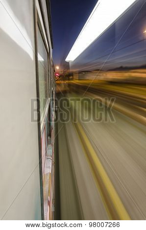 Train At Full Speed Crossing The Station