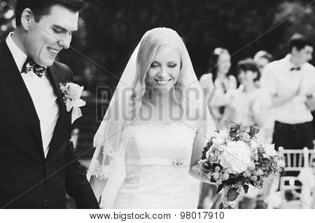 Happy Just Married Bride And Groom Walck After Vedding Ceremony Black And White