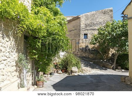 Houses And Flowers In An Old Village In South Europe