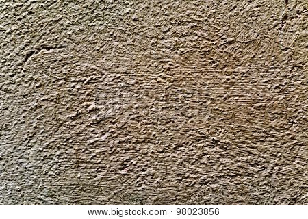 closeup of a rustic brown plastered wall