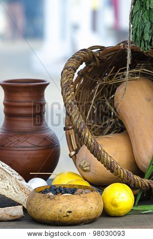 Medieval still life with milk jug and bread