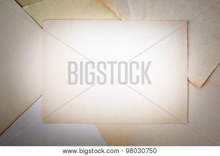 blank yellowed paper sheet at pile off paper sheets - vignette photo