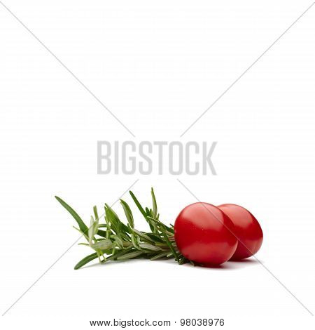 Two Red Cherry Tomatoes With Rosemary Branch Against A Pure White Background