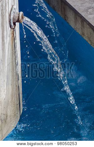 Water flows from the pipe