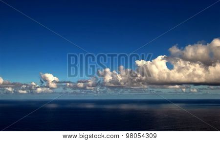 clouds floating over ocean