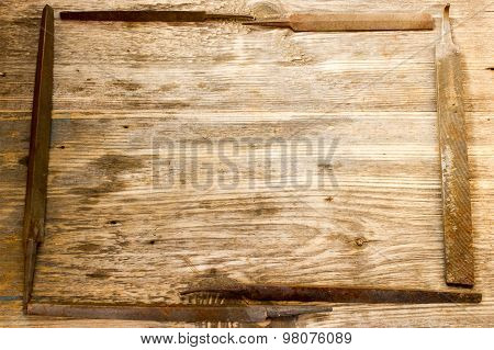 Various Different Steel Retro Rusty Rasp File Tool Collection Isolated On Wooden Background. Copy Sp