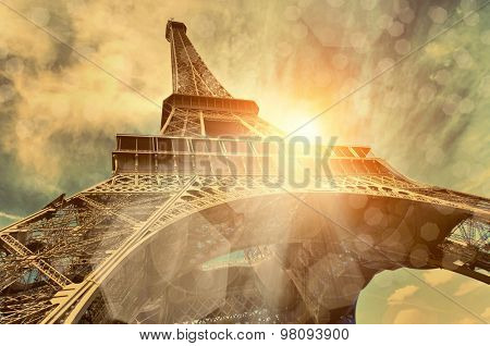 The Eiffel tower is one of the most recognizable landmarks in the world under sun light