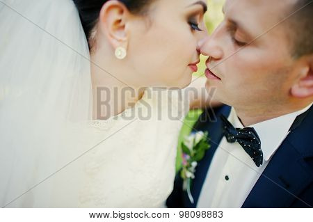Close Up Portrait Of Wedding Couple