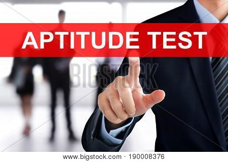 Businessman Hand Touching Aptitude Test Tab On Virtual Screen