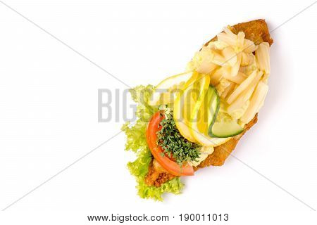 Danish specialties and national dishes high-quality open sandwich isolated on white background. fish fillet and garnished with remoulade and lemon
