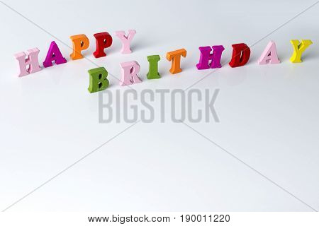 The Word Happy Birthday On A White Background