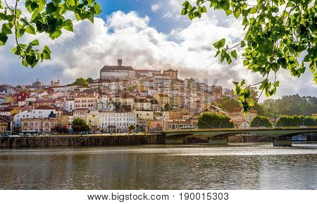 View at the university city Coimbra with river Mondego in Portugal