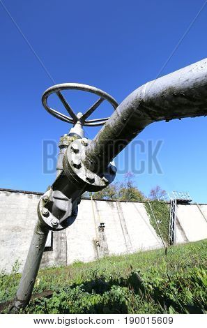 Valve In A Large Industrial Plant Photographed From Below