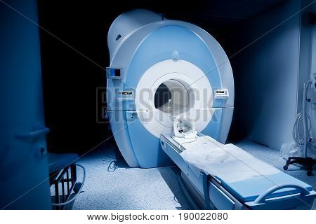 Radiologist in the room, magnetic resonance therapy in the hospital. Concept diagnosis cancer disease.