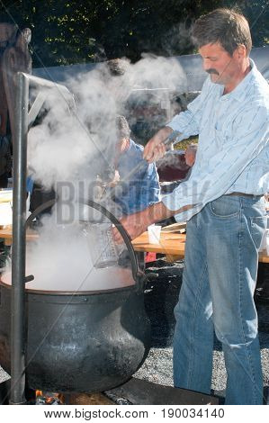 Man Preparing A Traditional Drink With Coffee And Liqueur