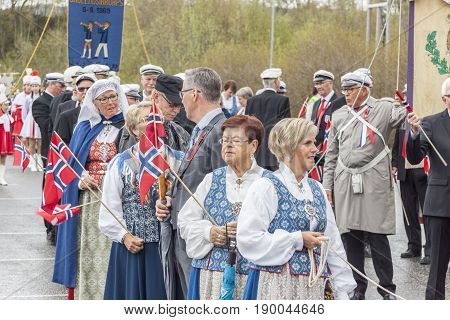 VERDAL NORWAY - MAY 17 2017: National day in Norway. Norwegians at traditional celebration and parade on may 17 2017 in Verdal. People on parde before school in Verdal. Constitution Day is the National Day of Norway and is an official national holiday.