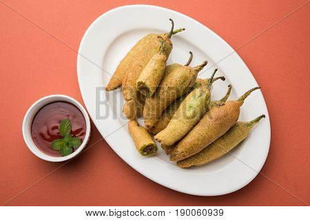 Stuffed Chilli Pakora or mirchi pakoda or mirchi vada, An extremely delicious and mouth watering snack of Pakistani & Indian People