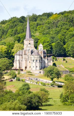 Cultures and church of Notre-Dame de Mont-Devant-Sassey in the department of the Meuse
