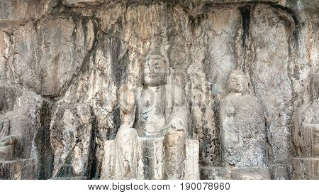 Carved Buddha Figure In Longmen Grottoes
