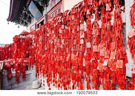 Red Signs On Temple On East Hill In Longmen