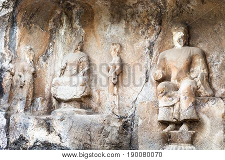 Carved Statues In Cave Of Longmen Grottoes