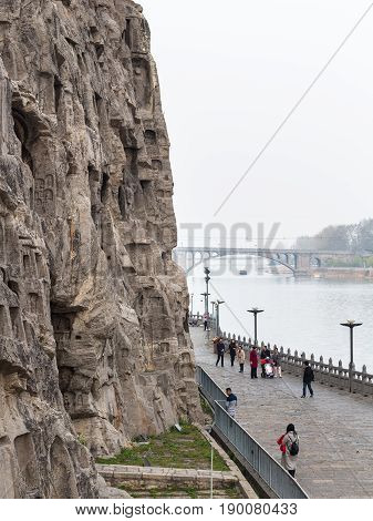 View Of Waterfront And Manshui Bridge In Longmen