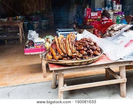 Local Smoked Pork Products In Front Of Eatery