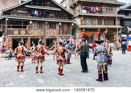 People In Round Dance On Square In Chengyang