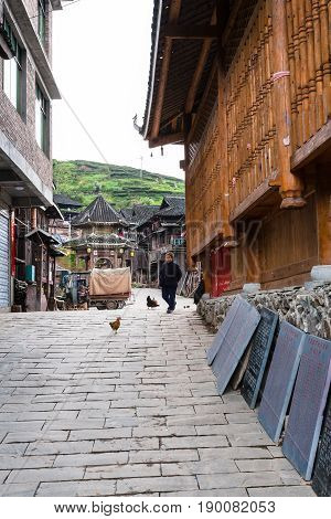 Woman On Alley In Chengyang Village