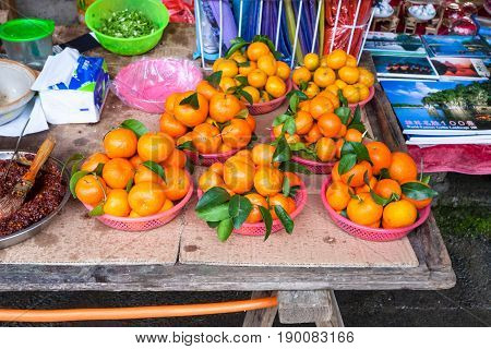 Mandarines On Stall In Market In Xingping Town