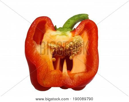 sweet red pepper sliced on half on white background, loking like scary face