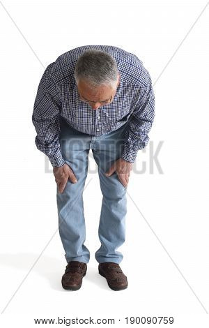 Man looking for a thing he has lost on white