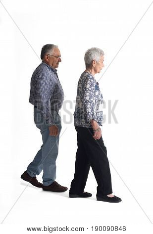 Full portrait couple walking on a white background