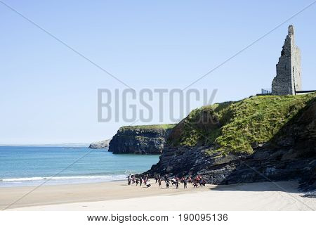 people training at surf school on ballybunion beach in county kerry ireland