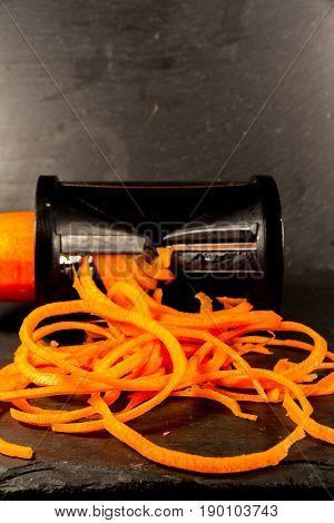 Spiralizer with spiralised Carrot close up or macro..