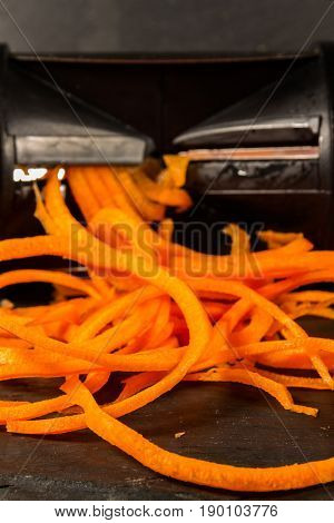 Spiralizer with spiralised Carrot close up or macro.