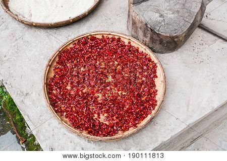 Pieces Of Red Hot Pepper On Plate Dry Outdoors