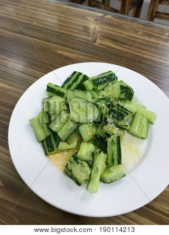 Salad From Fresh Cucumbers In Cheap Eatery