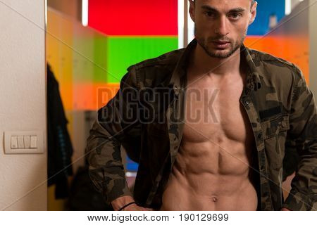 Adult Man In Locker Room Changes Clothings