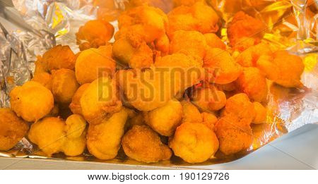 Homemade fritters with sugar and its ingredients.